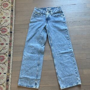 Levi's Light Blue Wide straight Leg Jeans model is the SUPERLOW size 24